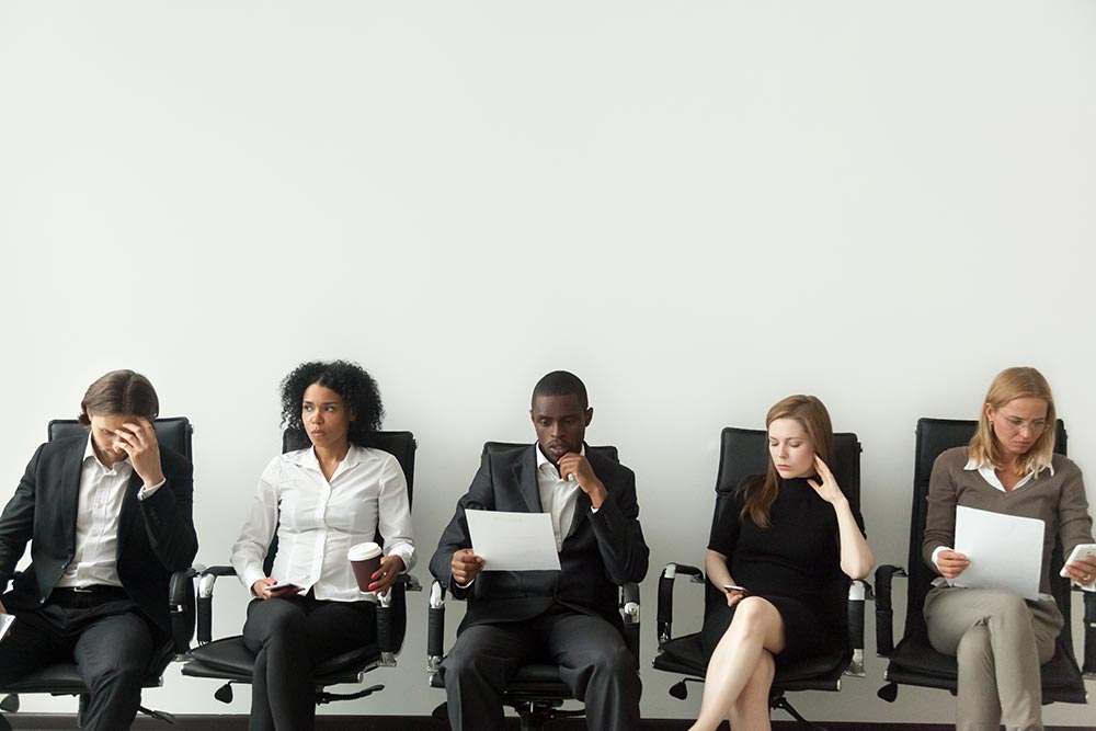 Office Space, employees sitting down